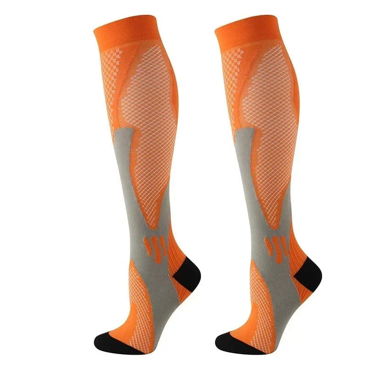 Uniseks compressiekousen voor optimale ondersteuning en comfort; ideaal tegen vermoeide benen en zwelling.