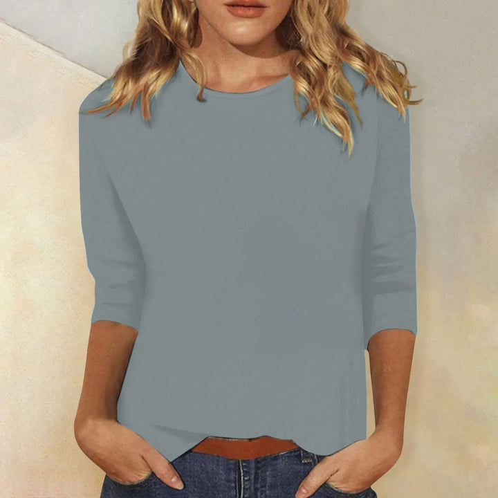 Stijlvol dames shirt met ronde hals en lange mouwen, perfect voor casual of chique mode.