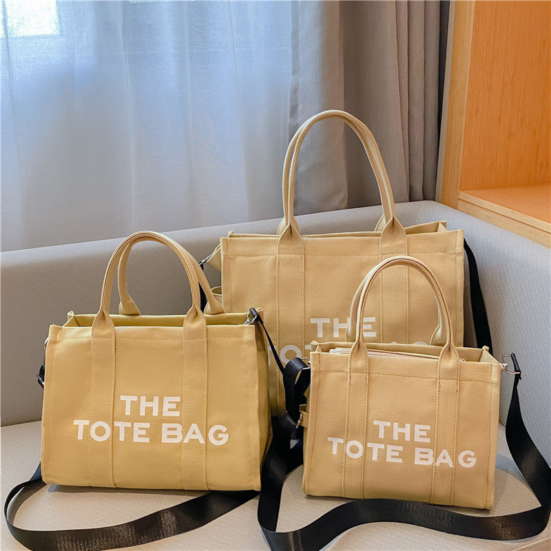 Elegante en praktische canvas dames draagtas, veelzijdig als handtas of schoudertas voor modebewuste vrouwen.