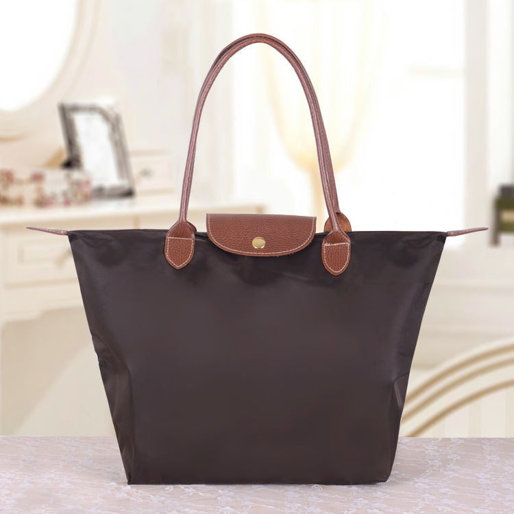 Modieuze dames schoudertas in oxfordstijl, perfect accessoire voor elke gelegenheid.
