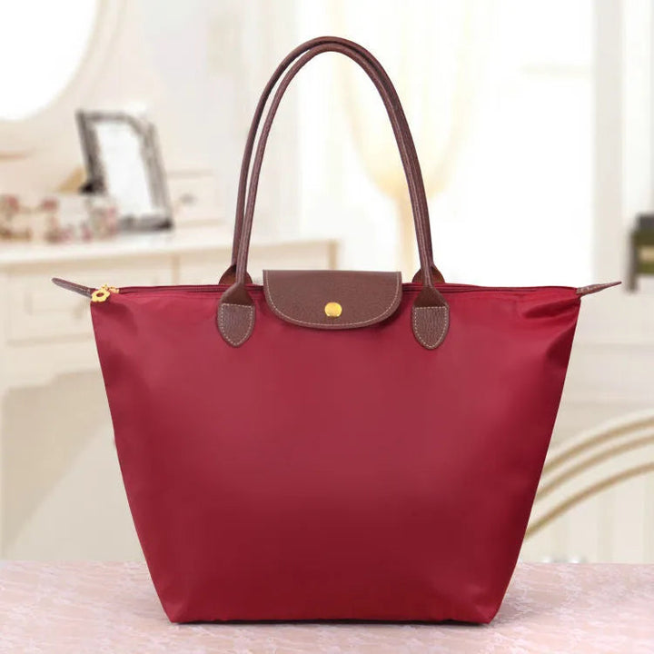 Elegante dames schoudertas; een essentieel mode accessoire voor een complete look.