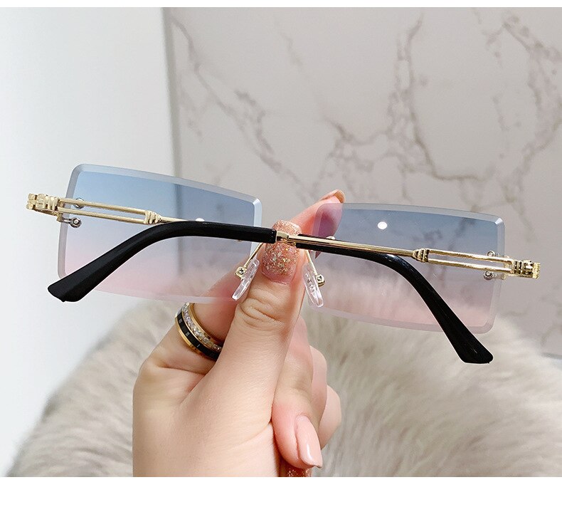 Elegante rechthoekige dames zonnebril. Een essentieel accessoire voor fashion-bewuste vrouwen.