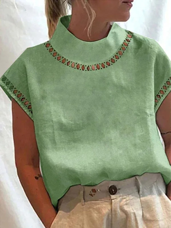 Stijlvolle dames zomer top met verfijnd elegant design. Comfortabele en chique blouse voor warme zomerdagen.