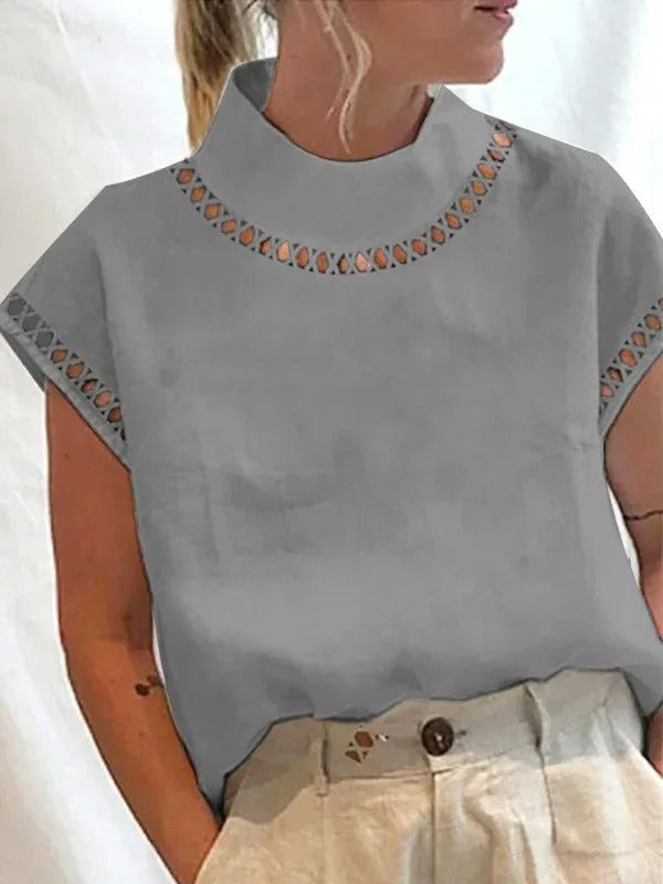 Modieuze dames blouse, elegante zomer top. Ideaal voor een stijlvolle dameskleding look met een casual chic twist.