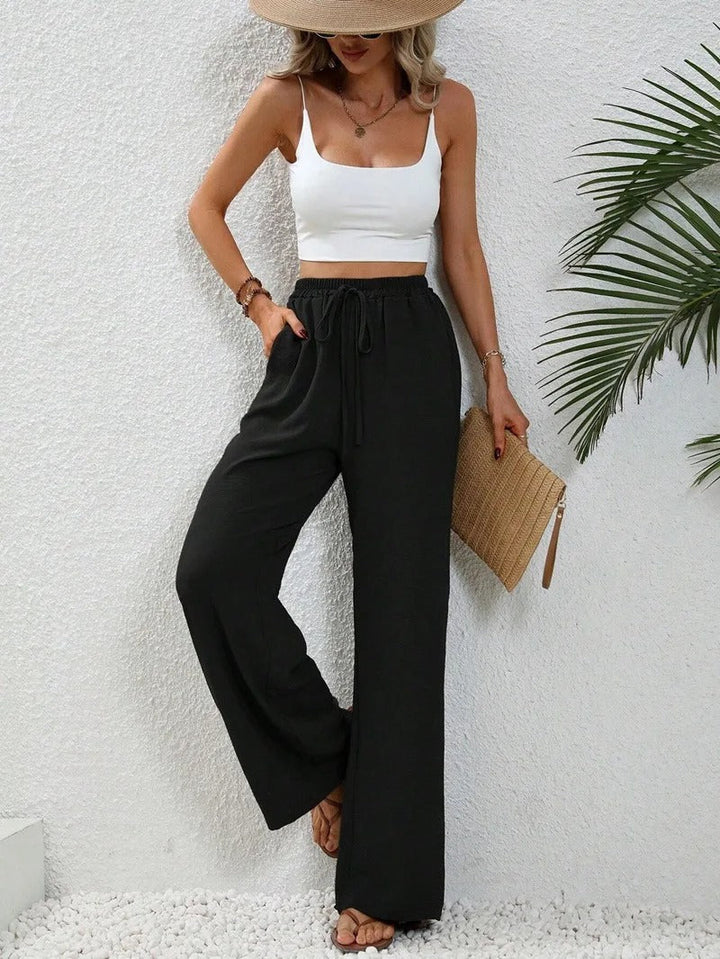 Stijlvolle damesbroek met rechte pijpen voor een elegante of casual zomerlook. Comfortabel en veelzijdig.