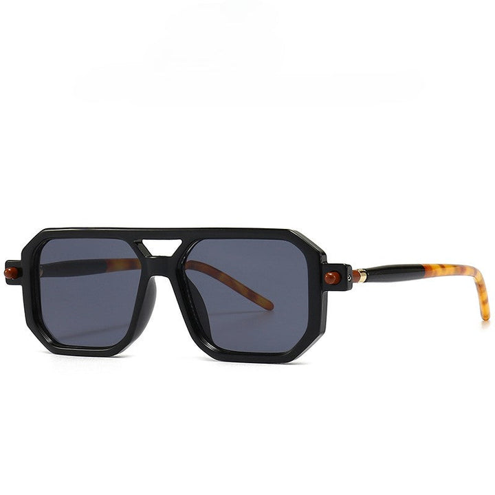 Zwarte oversized vierkante zonnebril unisex, met blauw licht filter. Trendy fashion accessoire voor je ogen.