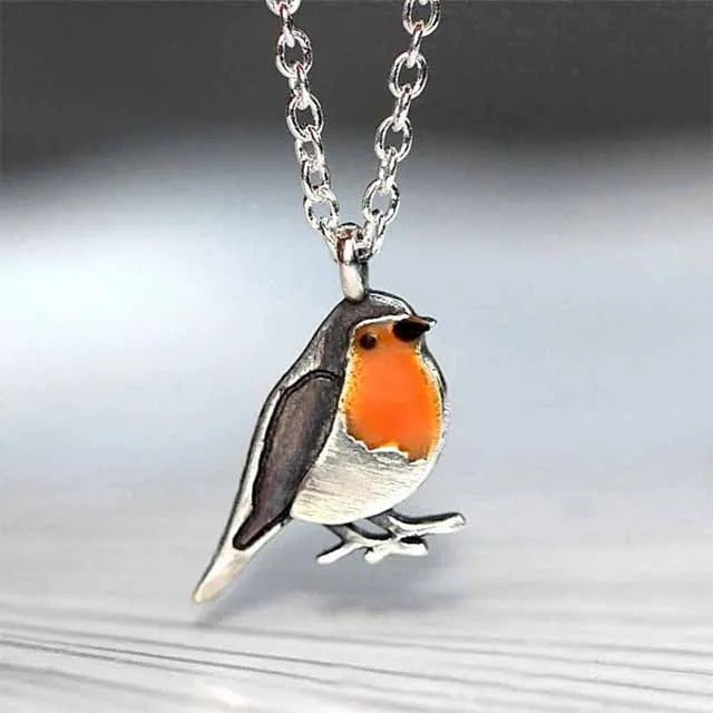 Stijlvolle geluksvogel sieradenset voor dames, bestaande uit ketting en bijpassende oorbellen. Hoop & nieuw begin.
