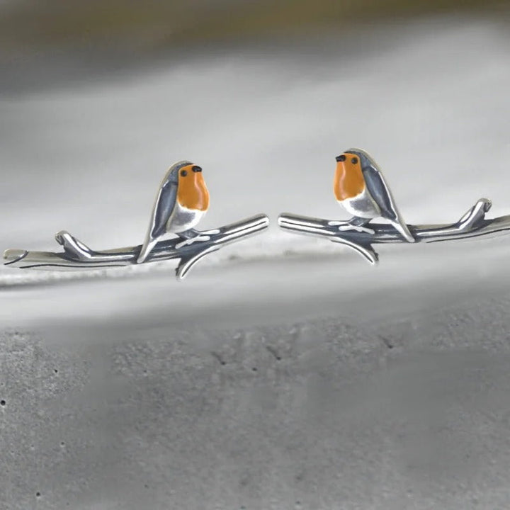 Compleet dames sieradenset met geluksvogel ketting en oorbellen, tentoongesteld als symbool van hoop en nieuwe kansen.
