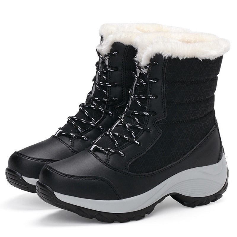 Zijaanzicht van robuuste warme dames winterlaarzen met anti-slip zool, voor veilige en comfortabele winterwandelingen.