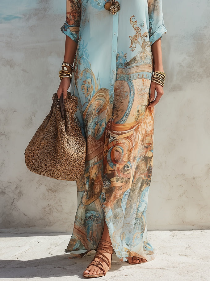 Elegante lange damesjurk met driekwartmouw en mooie paisleyprint; perfect als modieuze zomerjurk.