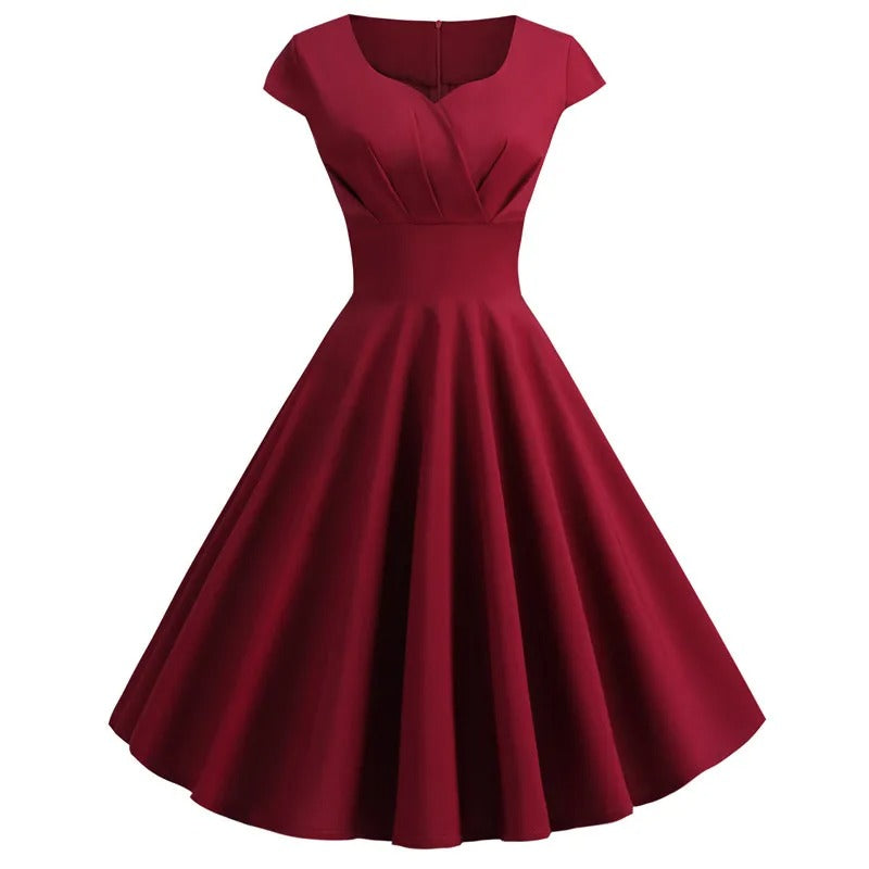 "Vintage A-lijn Marlena jurk in zwart, flatterend silhouet, gedefinieerde taille, ideaal voor dames bij feestelijke gelegenhe