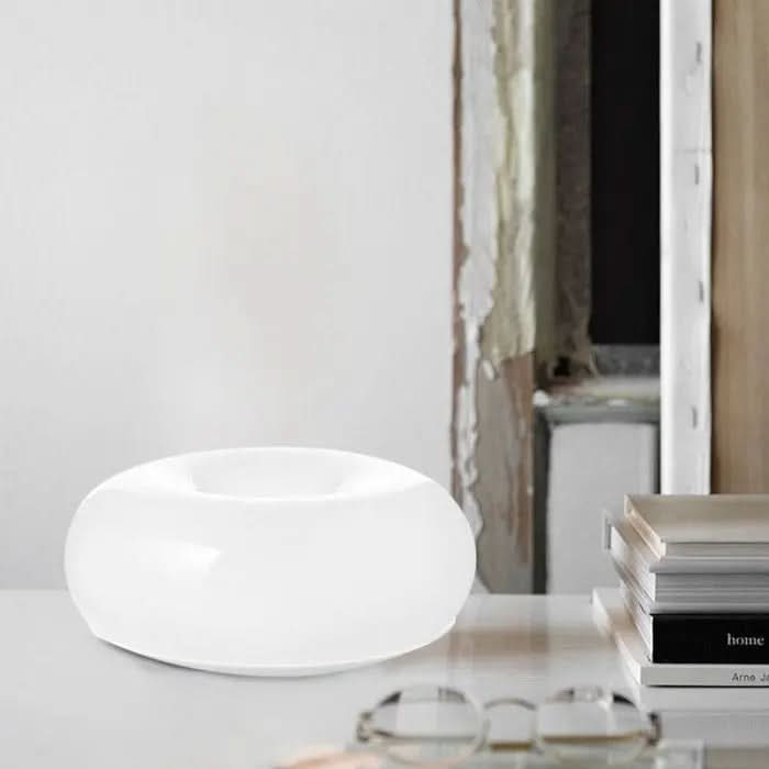 Compacte donut tafellamp, dimbaar met touch-sensor, beschikbaar in oranje of grasgroen voor elk interieur.