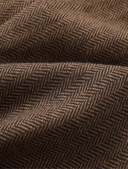 "Vintage heren gilet met elegante lijnen, authentieke stijl en hoogwaardige stoffen; veelzijdig voor elke outfit."