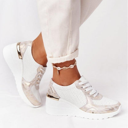 "Vrouwelijke Air Sneakers met ademende materialen, moderne look, flexibele zool en demping voor comfort en stijl."