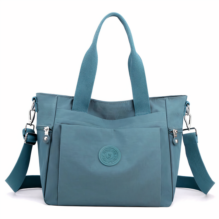 Stijlvolle dames handtas met grote capaciteit, waterdicht nylon. Perfect als dag- of reistas voor vrouwen.