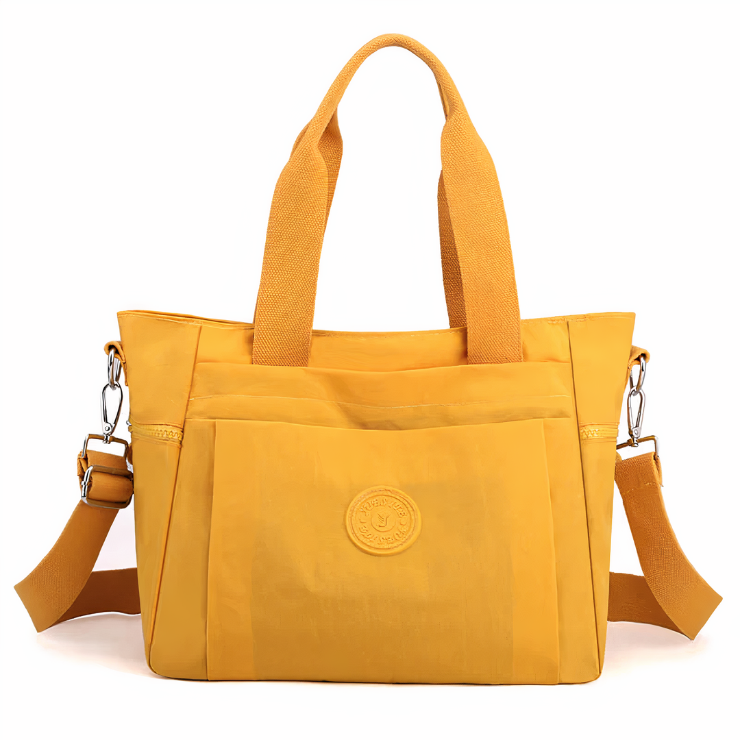 Ruime dames handtas met grote opslagcapaciteit, waterdicht nylon. Stijlvolle en praktische schoudertas voor vrouwen.