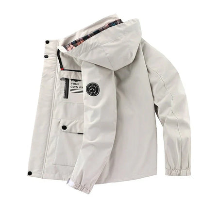 "Waterdichte tactische jas voor mannen, elegant ontwerp, ideaal voor avontuur en stijl, donkergrijs met meerdere zakken."