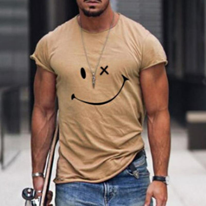 Trendy heren t-shirt met ronde hals en korte mouwen. Grote gele smiley grafische print voor een vrolijke, casual mode.