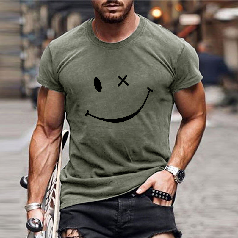 Vrolijk heren t-shirt met gele smiley print. Trendy grafische top met ronde hals, korte mouwen. Casual stijl.