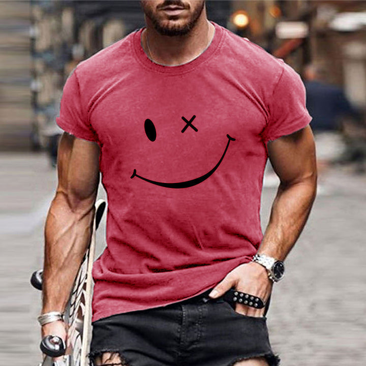 Heren t-shirt in positieve stijl met grote gele smiley grafische print. Comfortabele ronde hals, korte mouwen.