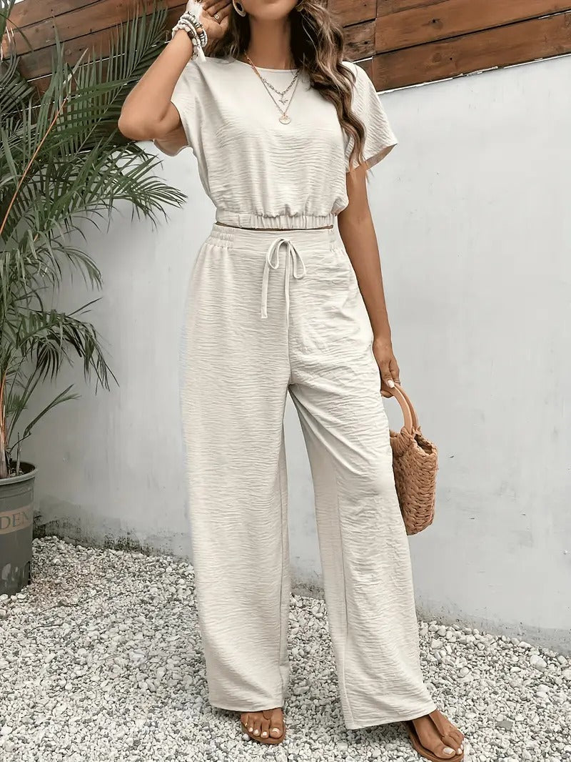 Heerlijke dames zomerset met comfortabele vleermuismouwen top en bijpassende broek, een must-have.