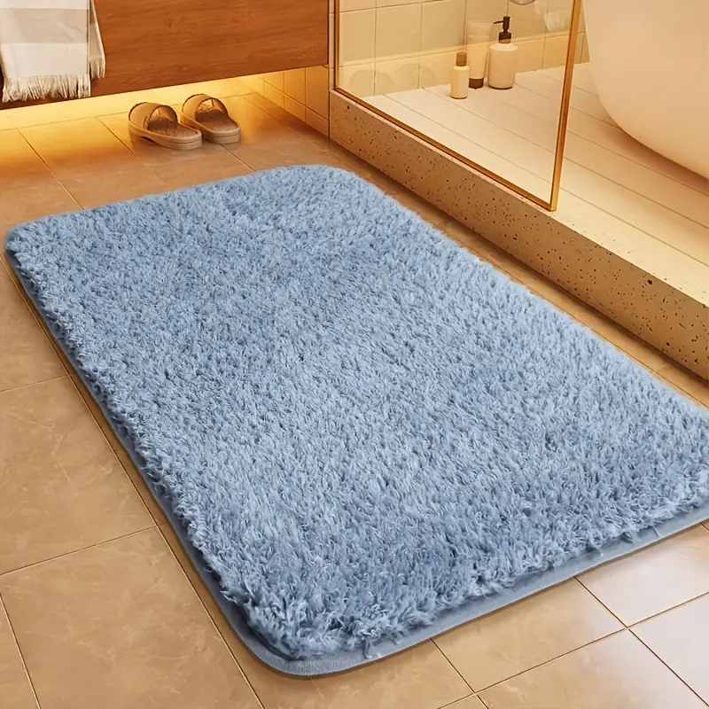 Stijlvolle AquaComfort badmat met afgeronde hoeken, zacht en antislip, perfecte woondecoratie voor de badkamer.