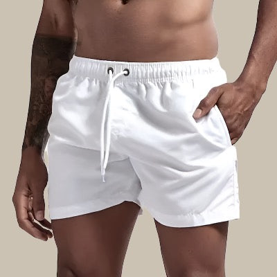 Geniet van de zomer met deze sneldrogende mannen zwembroek, comfortabel en klaar voor strand/zwembad.