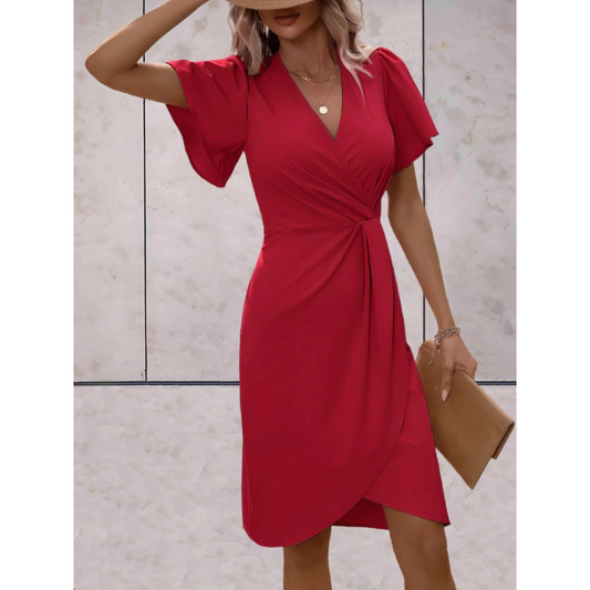 "Wikkeljurk met V-hals, flatterend ontwerp, elegante stijl voor feestelijke gelegenheden, accentueert silhouet, vloeiende mou