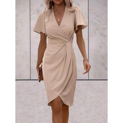 "Wikkeljurk met V-hals, flatterend ontwerp, elegante stijl voor feestelijke gelegenheden, accentueert silhouet, vloeiende mou