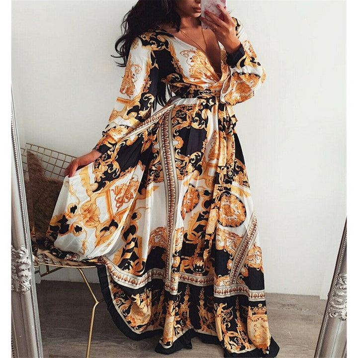 Elegante gele dames wikkeljurk met split. Lange mouwen, v-hals. Perfecte zomerse boho maxi jurk voor elke gelegenheid.