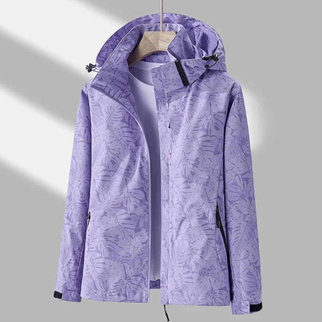 "Wind- en waterdichte Celine jas voor dames met trendy capuchon en slanke pasvorm, perfect voor outdoor avonturen."