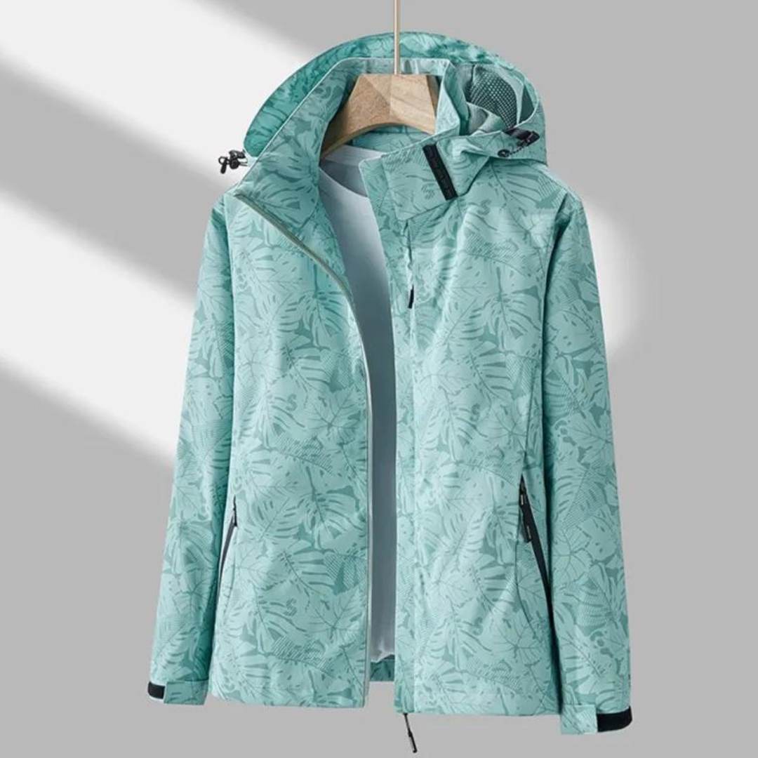 "Wind- en waterdichte Celine jas voor dames met trendy capuchon en slanke pasvorm, perfect voor outdoor avonturen."