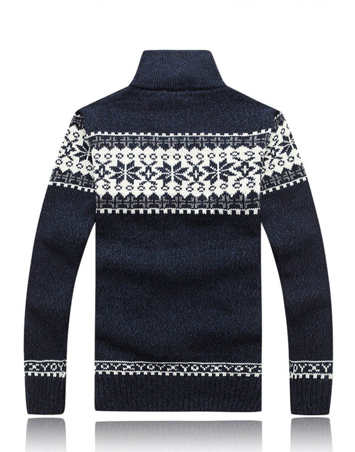Casual heren wintervest in blauw-wit gebreid design, gedragen door model. Comfortabel en warm.