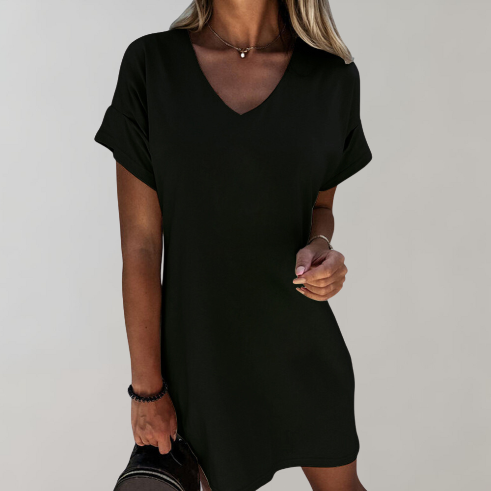 "Witte dames zomerjurk met wijde mouwen, casual en luchtig ontwerp, ideaal voor lente en zomerdagen."