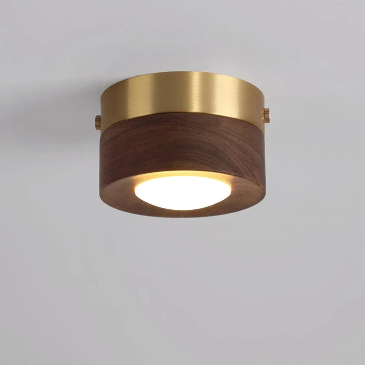Moderne ronde houten plafondlamp met geïntegreerde LED verlichting; perfect voor sfeervol interieur.