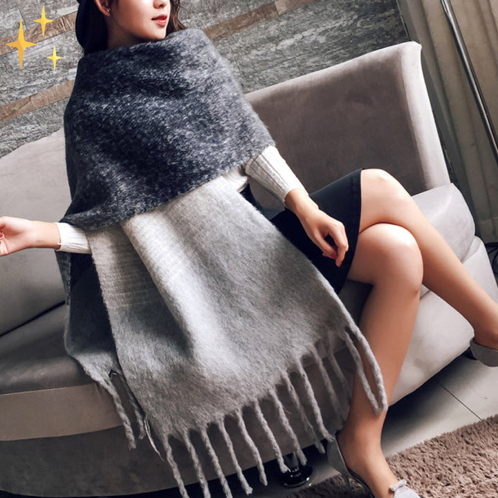 Stijlvolle dames plaid sjaal van cashmere, biedt zowel warmte als een chique uitstraling.