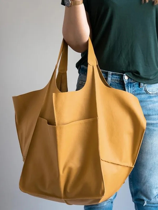 Maxine strandtas: klassieke dames handtas van PU-leer, ideaal voor zonnige dagen.