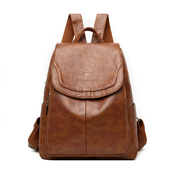 Detail van de textuur van de anti-diefstal PU leren mini rugzak voor vrouwen; compact en chic.