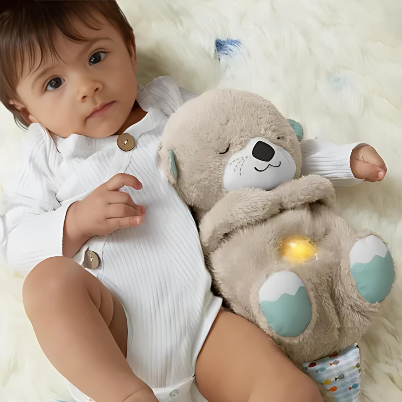 Pluche knuffel met ademhalingssimulatie en zacht nachtlampje voor stressverlichting bij kinderen en volwassenen.