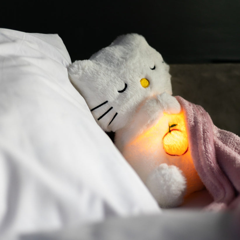 Premium pluche knuffel met realistische ademhalingssimulatie en sfeervol nachtlampje; voor rust en troost.