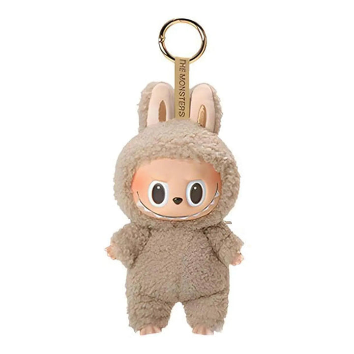 Klein pluche monstertje sleutelhanger, schattig en opvallend, ideaal tasaccessoire.