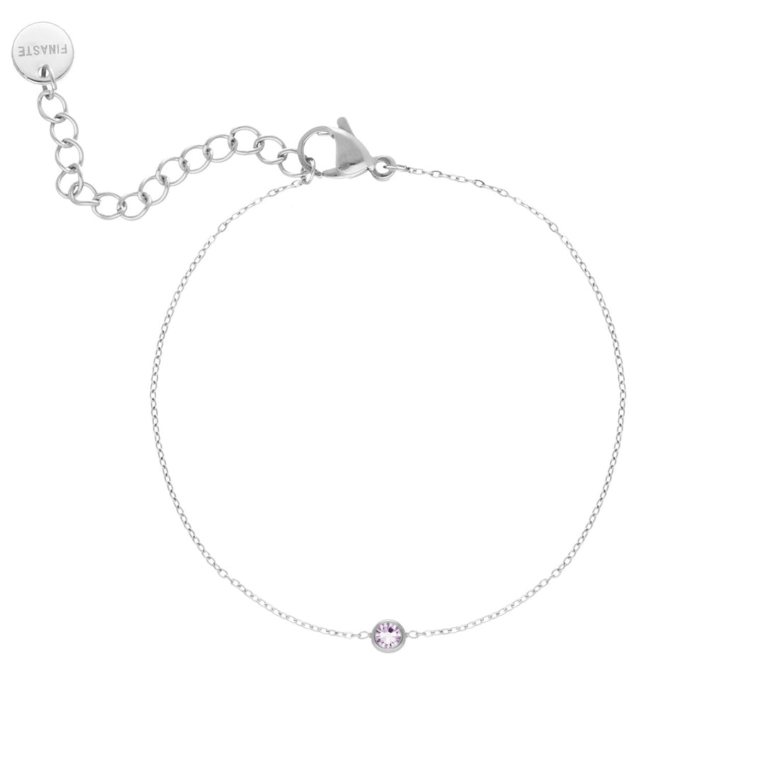 Elegante gouden armband met heldere ronde edelsteen, ideaal voor een persoonlijke touch.