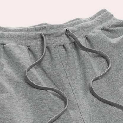 "Zomerse heren joggingbroek in oversized stijl, katoenmix, met elastische tailleband en trekkoord voor optimaal comfort."