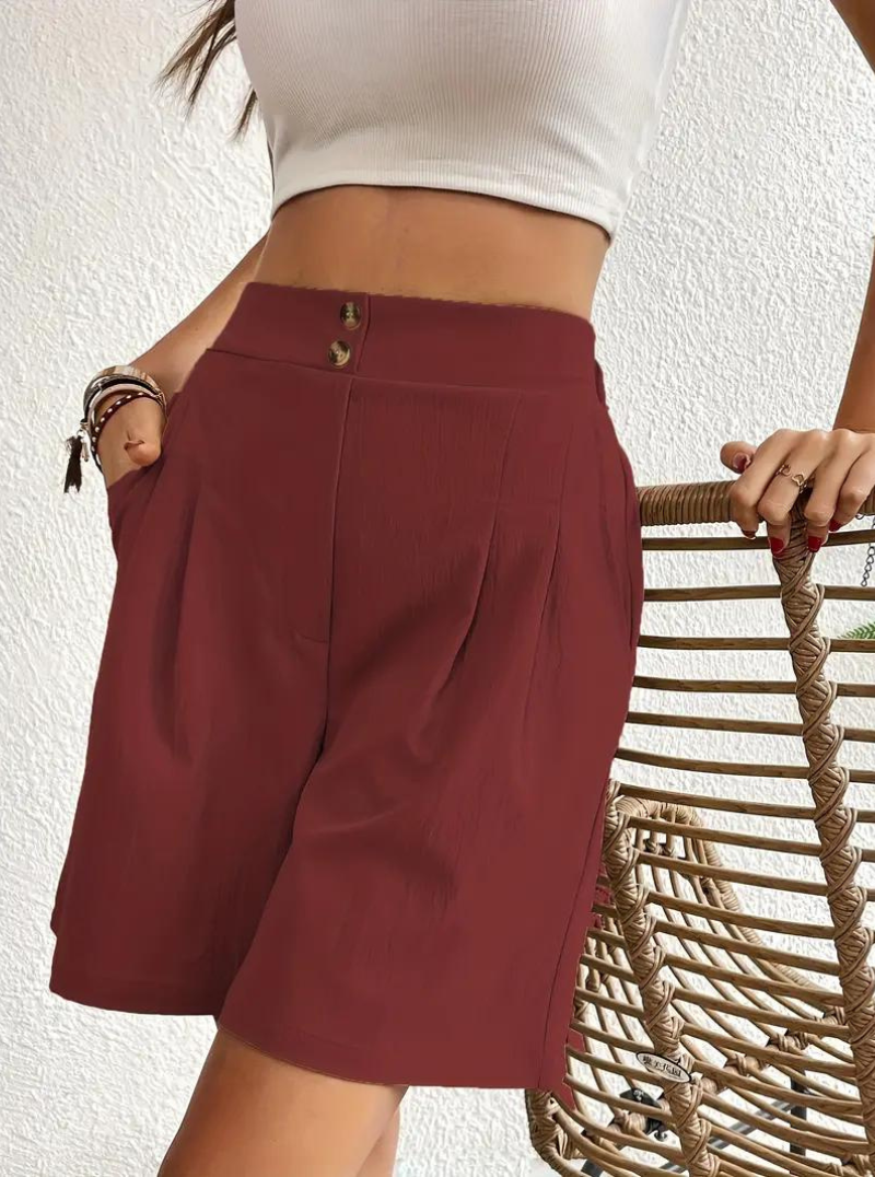 "Zomershort met plooien, hoge taille, zakken en luchtige pasvorm, ideaal voor elegante, comfortabele zomerse look."