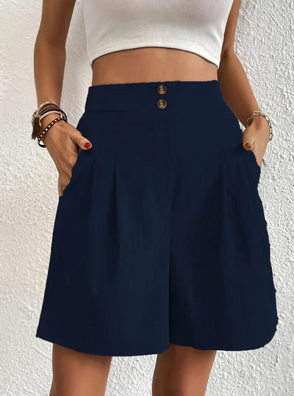 "Zomershort met plooien, hoge taille, zakken en luchtige pasvorm, ideaal voor elegante, comfortabele zomerse look."
