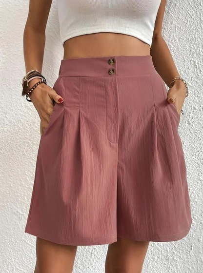 "Zomershort met plooien, hoge taille, zakken en luchtige pasvorm, ideaal voor elegante, comfortabele zomerse look."