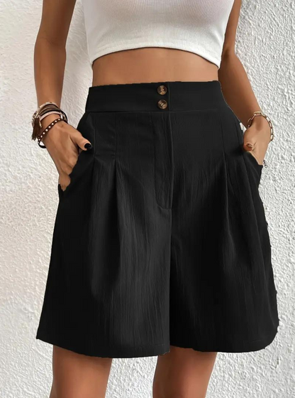 "Zomershort met plooien, hoge taille, zakken en luchtige pasvorm, ideaal voor elegante, comfortabele zomerse look."
