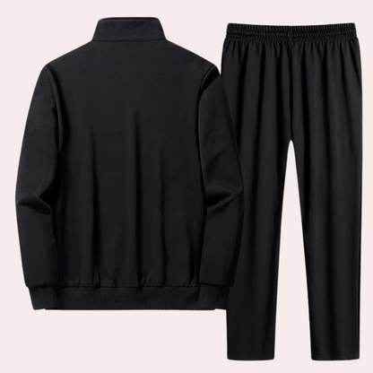 "Zwart heren trainingspak met jas, opstaande kraag en elastische tailleband voor ultiem comfort en stijlvol design."