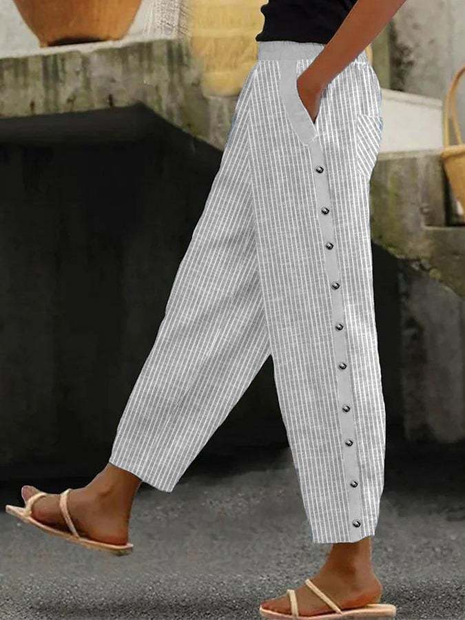 "Zwarte hemelzachte comfortbroek voor dames met elastische tailleband, elegant design en praktische zakken, perfect voor loun