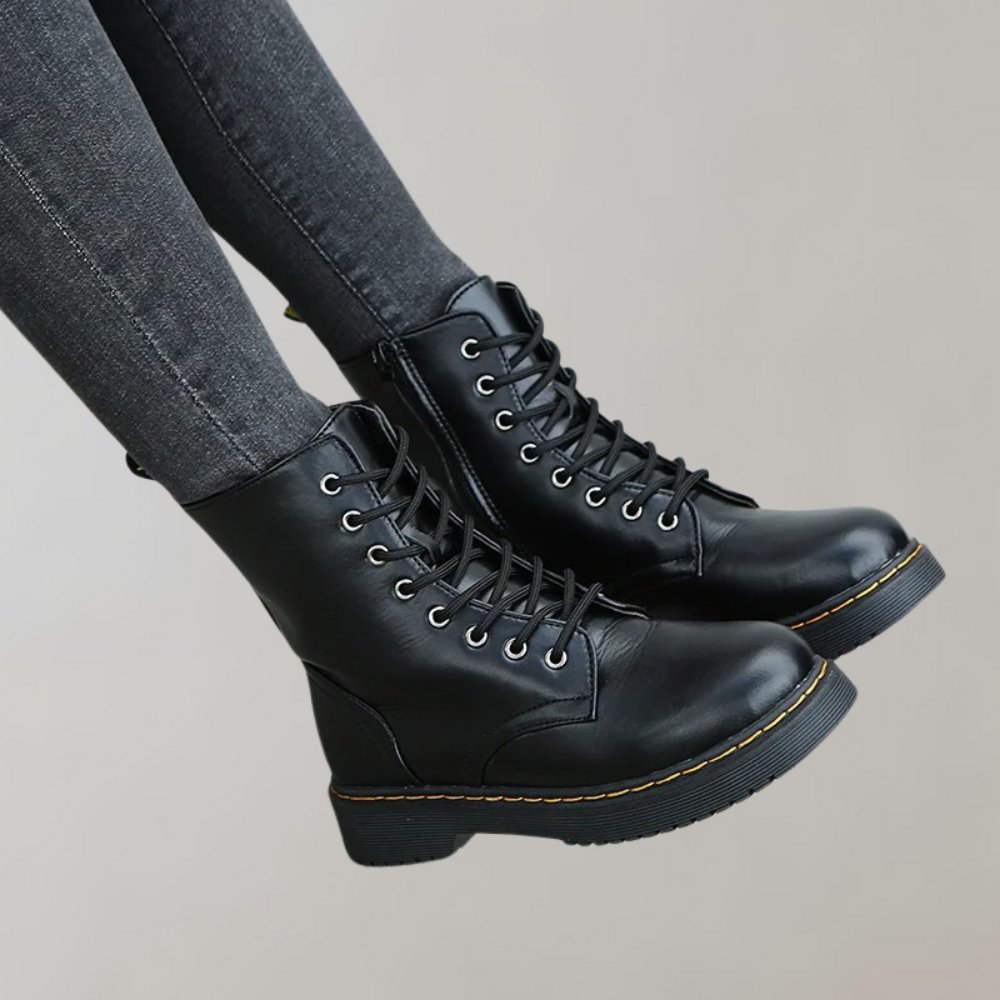 Zwarte leren dameslaars met veters, elegant design, klassiek en duurzaam, perfect voor dagelijks gebruik en speciale gelegenh
